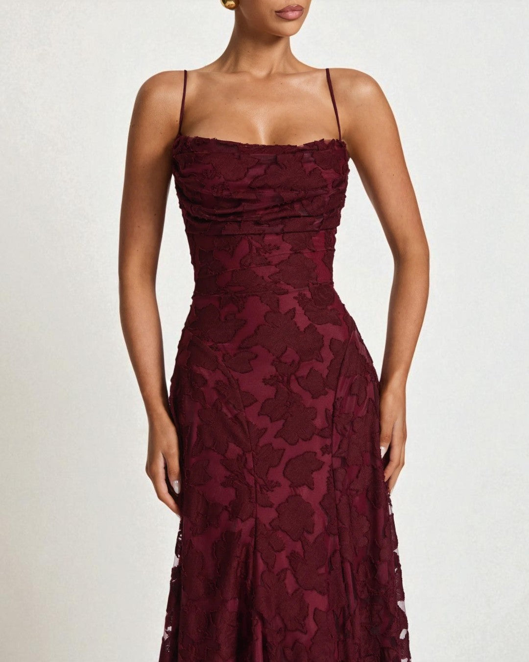 Close-up of lace detail on Francis red bridesmaid dress