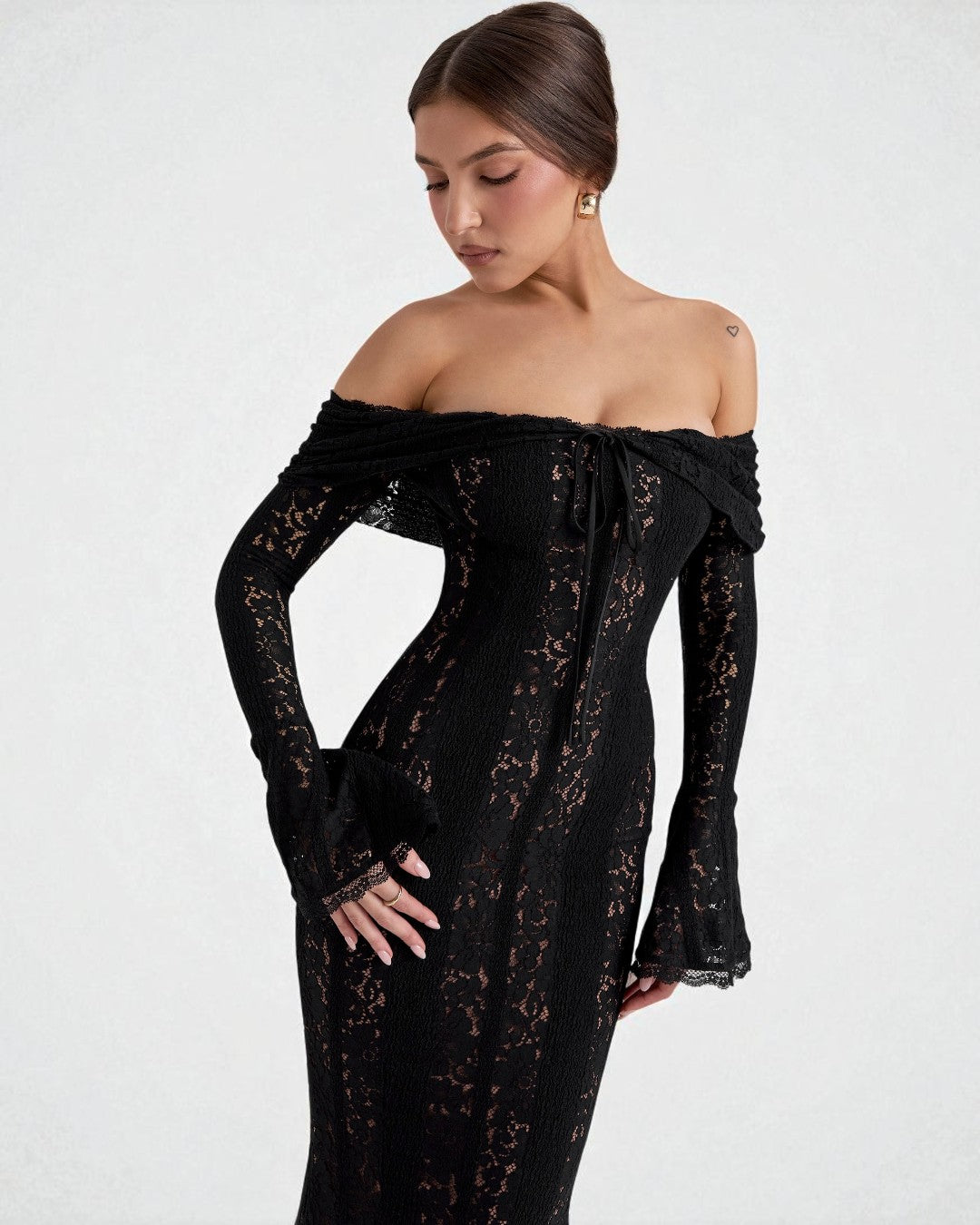 The black off-shoulder prom gown highlighting delicate lace details